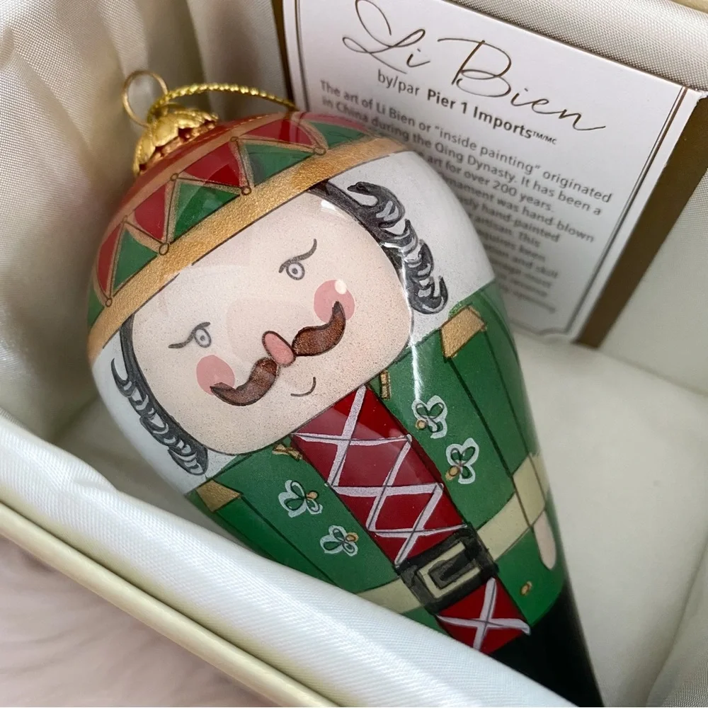 Li Bien Pier 1 Nutcracker Glass Ornament 2017